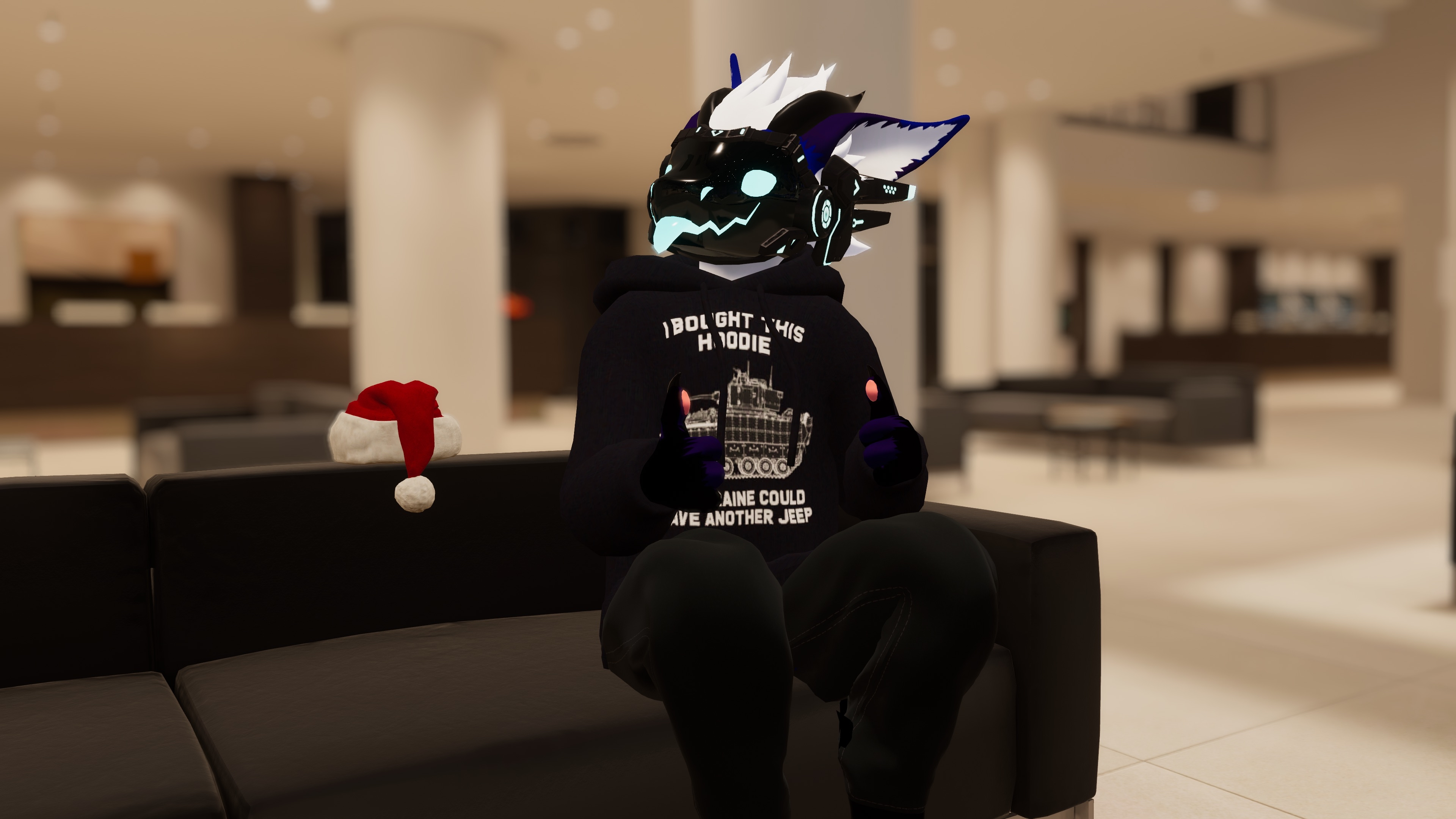 Riøt sitting on couch in VRChat