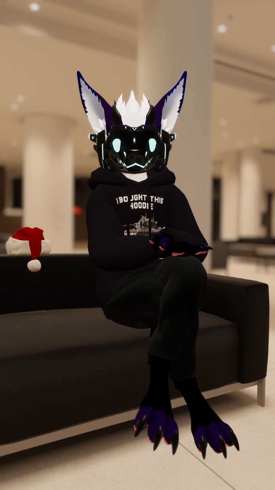 Riøt seated with hoodie